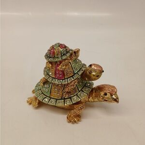 I believe it’s 1990’s Multicolored Hinged Turtle Trinket Box